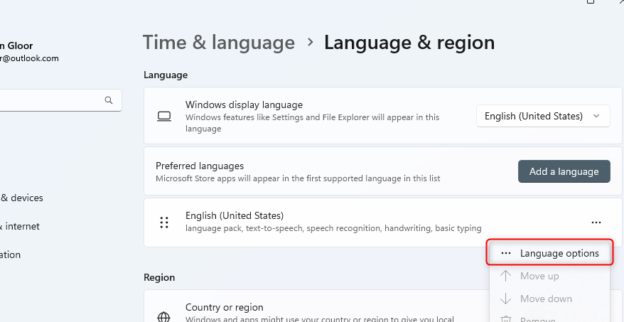 The Language & Region settings in Windows 11 with the Language Options option highlighted.